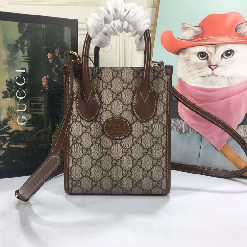 G*u*i top handle bags